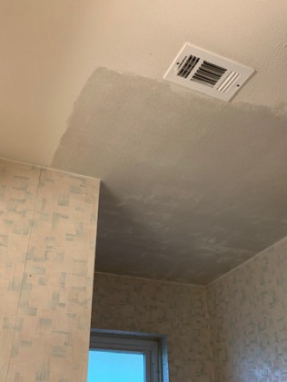 This customer from Sugar Land has water damage in the bathroom and a plumber came and cut out a section of the ceiling to repair a busted pipe. We came in and removed all the water damaged drywall and installed new drywall and texture to match. The customer wanted to paint the ceiling herself.